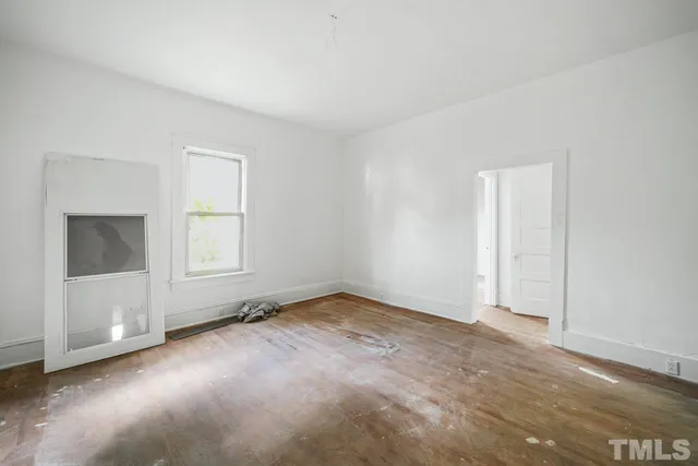 an empty room with windows