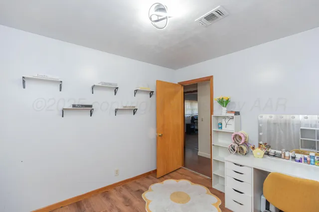 a workspace with a dresser