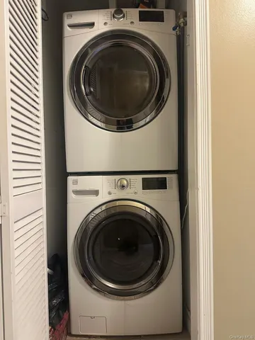 a view of wooden deck and city view