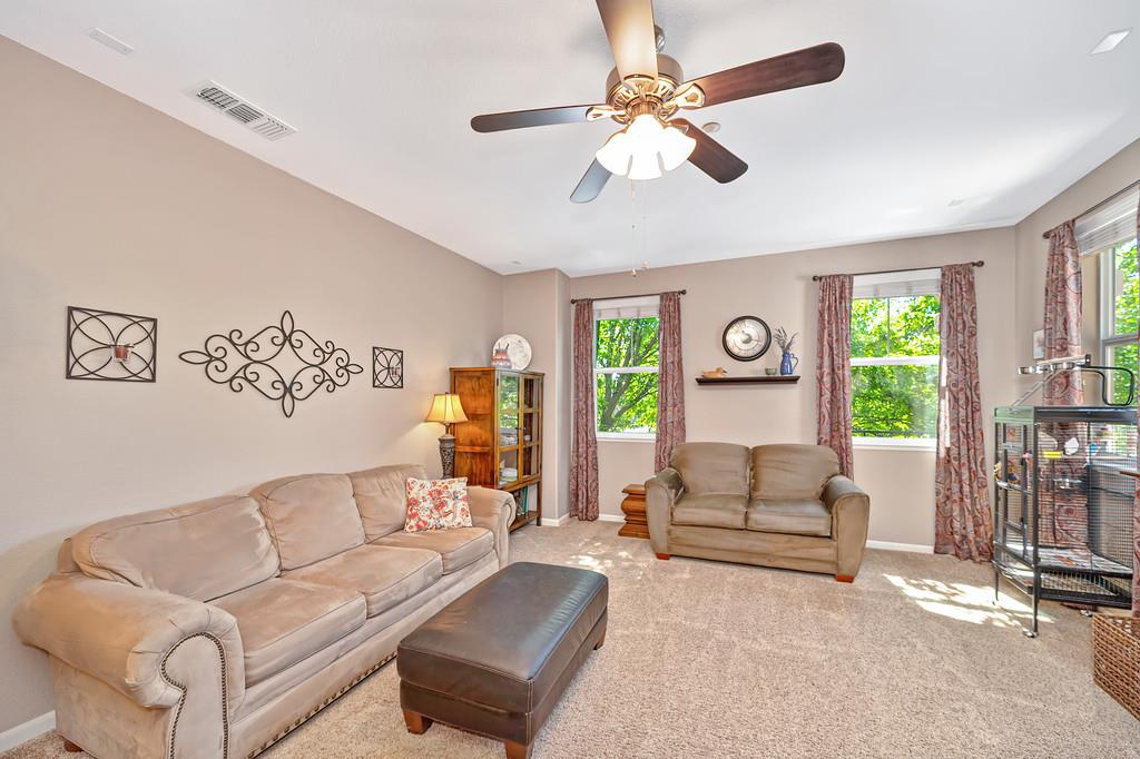 2603 Las Palomas Loop Lincoln, CA 95648 - Photo 4 of 22 a living room with furniture and a large window