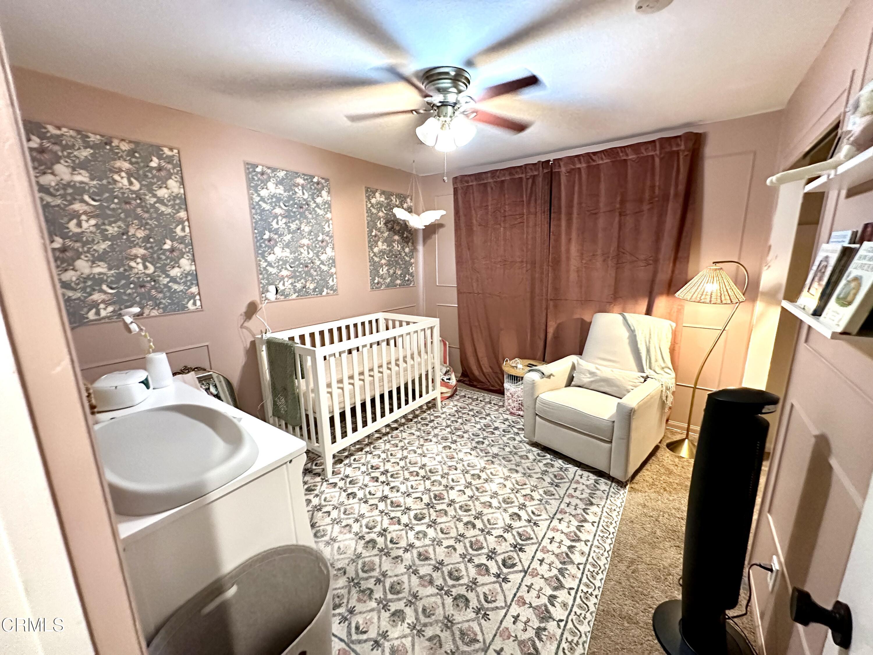 4621 Hamilton Avenue Oxnard, CA 93033 - Photo 12 of 22 a living room with furniture and a window