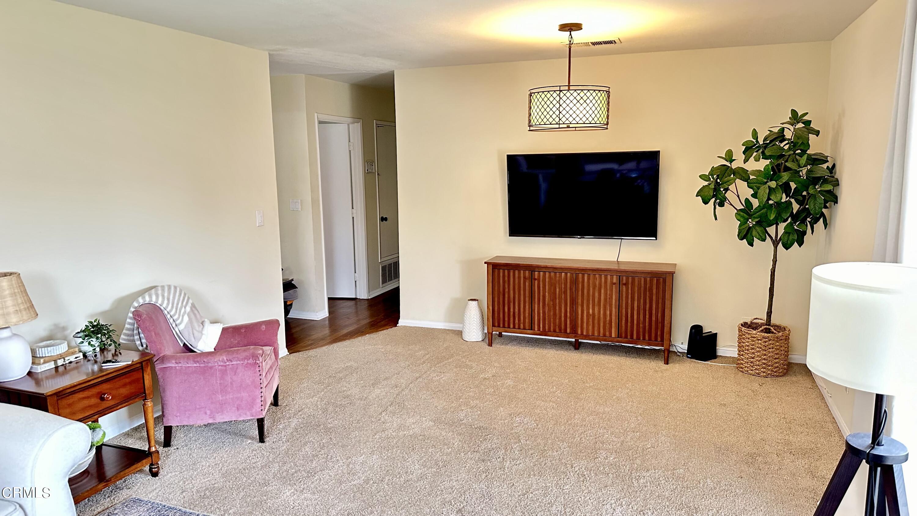 4621 Hamilton Avenue Oxnard, CA 93033 - Photo 19 of 22 a living room with furniture and a flat screen tv