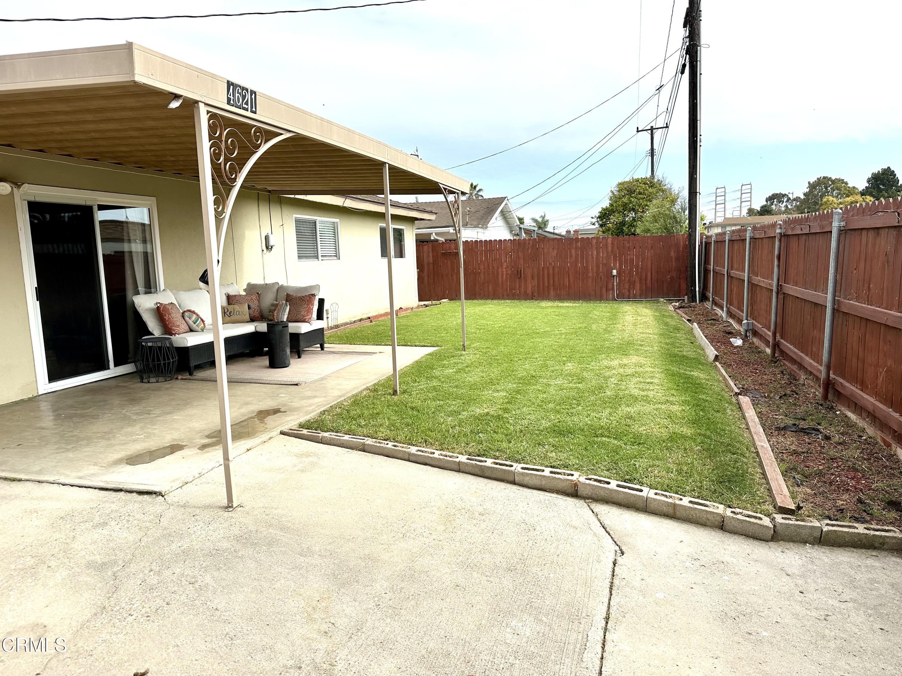 4621 Hamilton Avenue Oxnard, CA 93033 - Photo 21 of 22 a view of a house with backyard and a chair