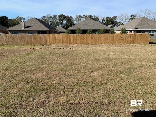 9439 Eiland Drive, Unit 38 Foley, AL 36535 - Photo 17 of 20 View from rear covered po