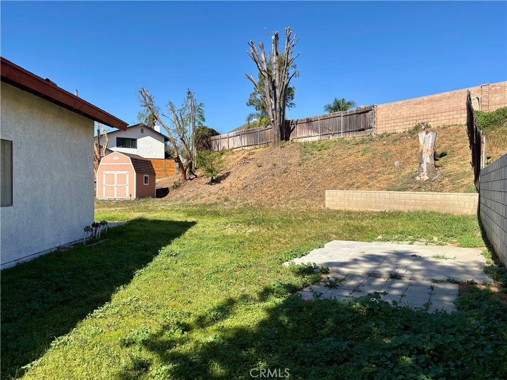 5715 Favela Drive Riverside, CA 92509 - Photo 14 of 27 a view of a back yard of the house