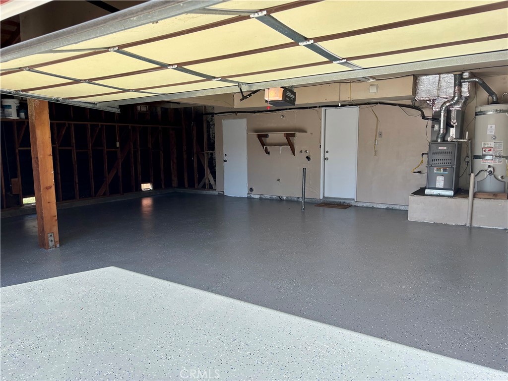 5715 Favela Drive Riverside, CA 92509 - Photo 2 of 27 a view of a car garage