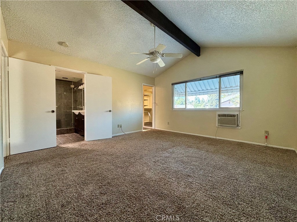 5715 Favela Drive Riverside, CA 92509 - Photo 23 of 27 an empty room with windows and closet