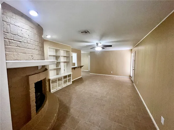 a view of a livingroom with a fireplace