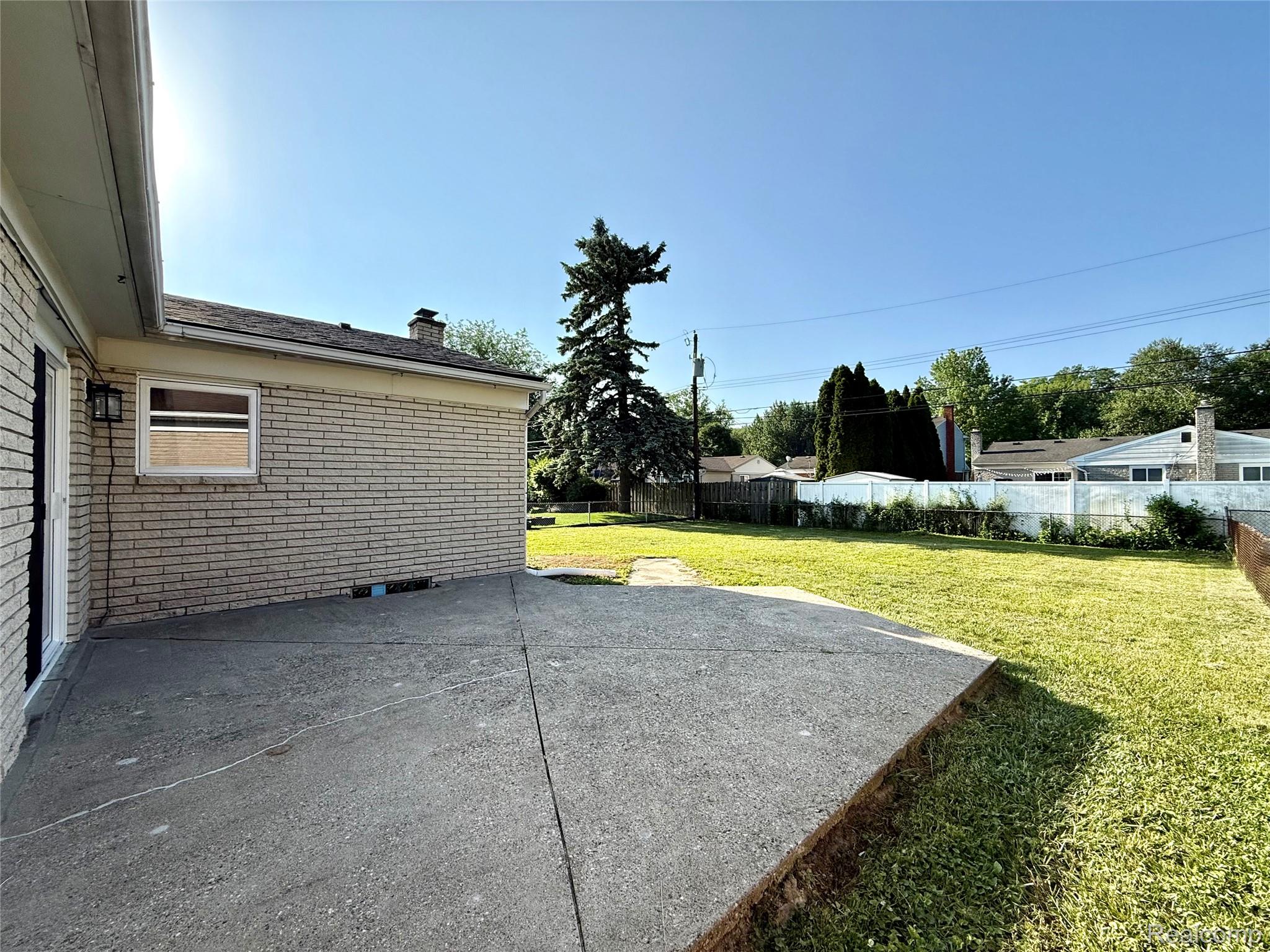 39909 Lynn Street Canton, MI 48187 - Photo 39 of 45 Expansive concrete patio offering generous outdoor space