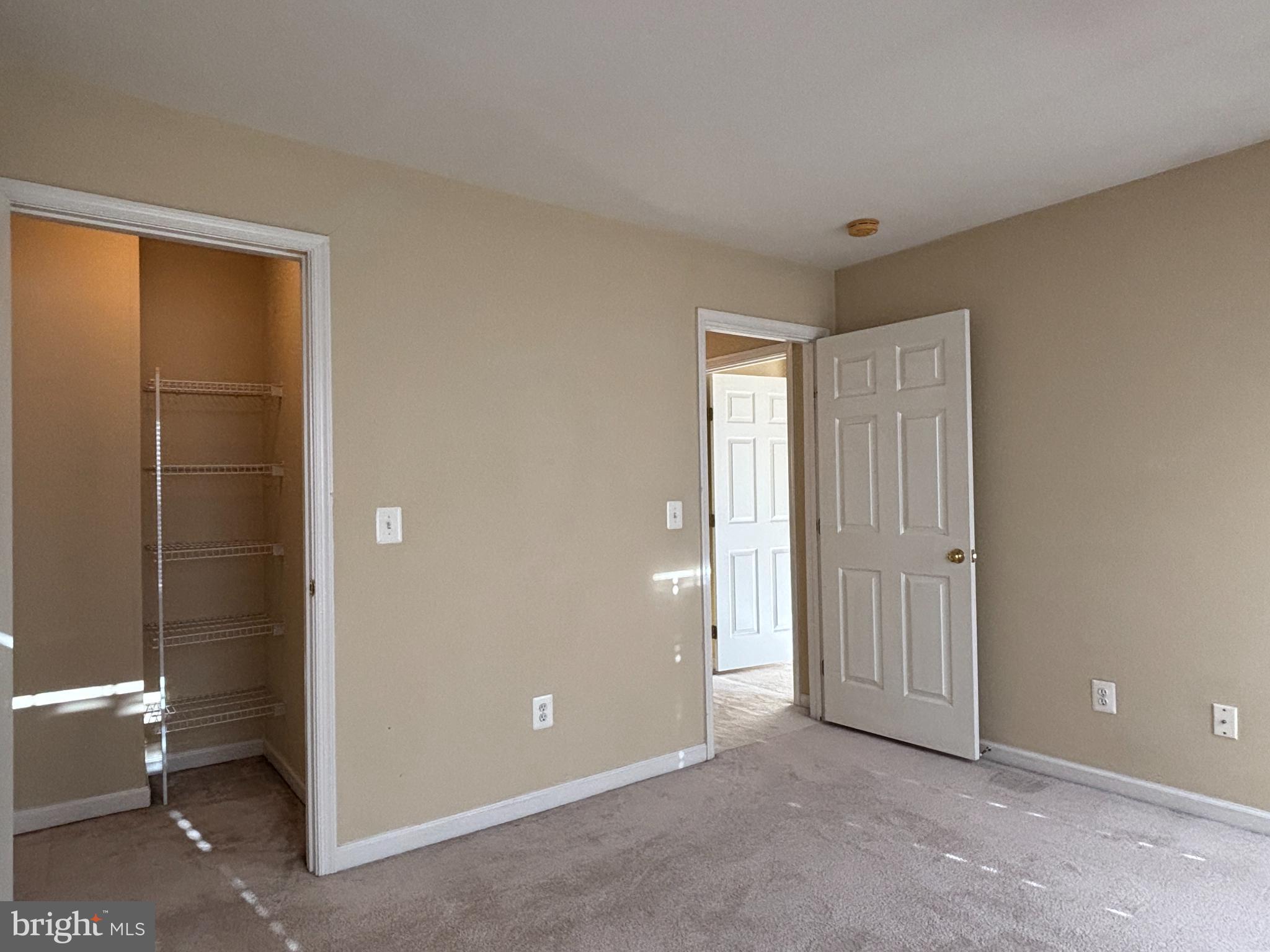 1538 Grosbeak Court Woodbridge, VA 22191 - Photo 14 of 39 a view of an empty room with glass door and a bathroom