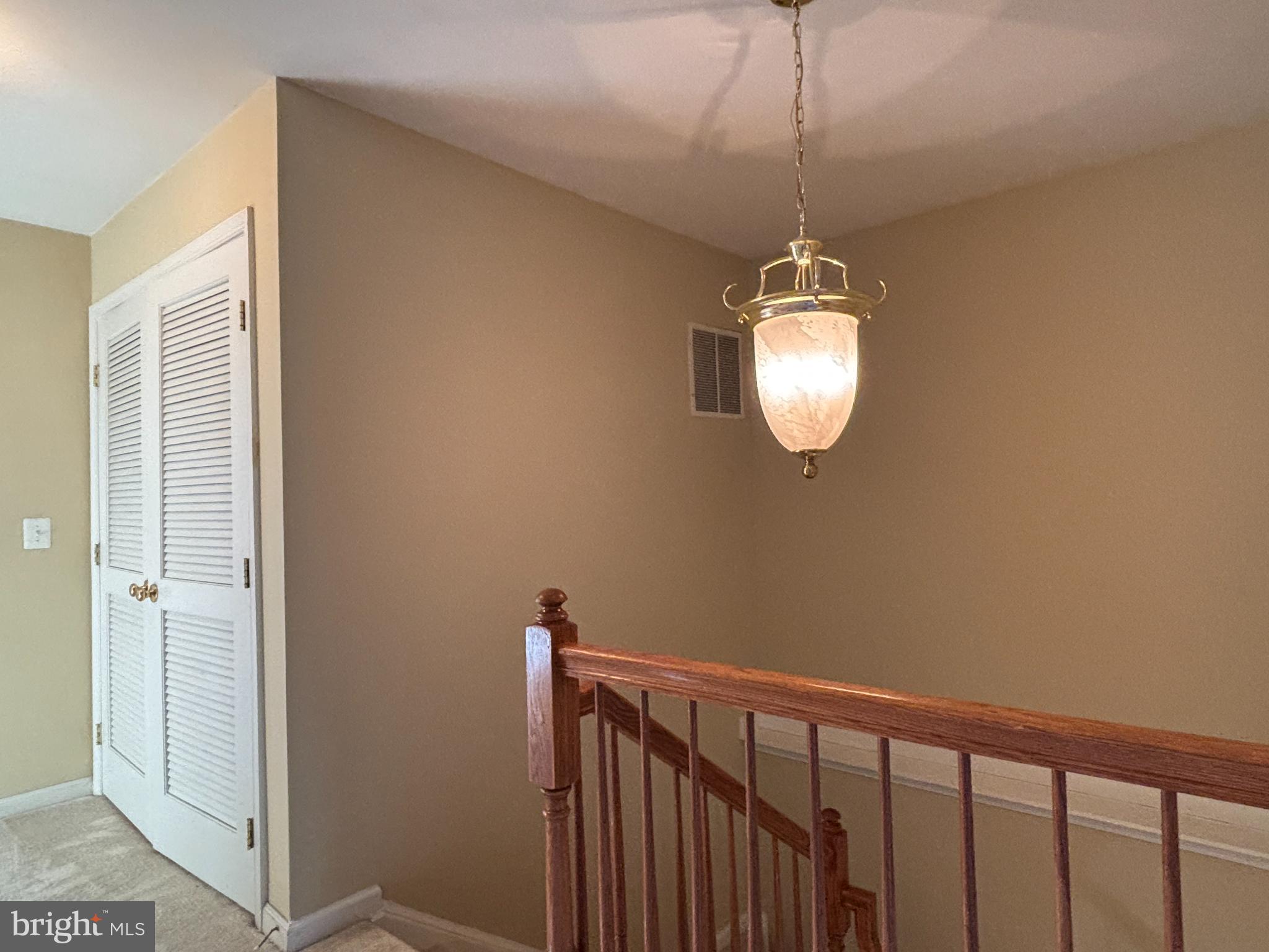 1538 Grosbeak Court Woodbridge, VA 22191 - Photo 23 of 39 a room with wooden floor and windows