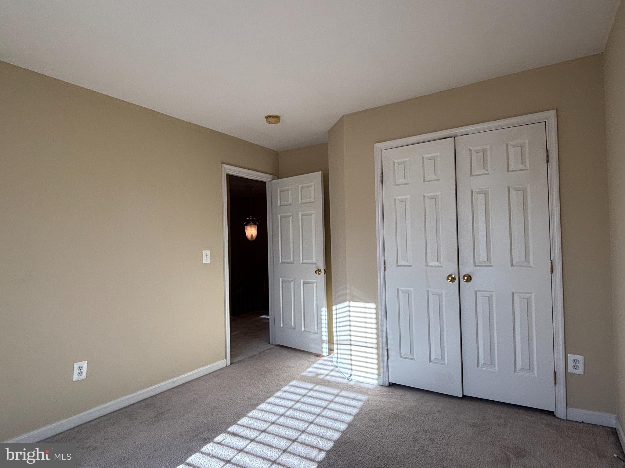 1538 Grosbeak Court Woodbridge, VA 22191 - Photo 27 of 39 a view of a livingroom with wooden floor and cabinet
