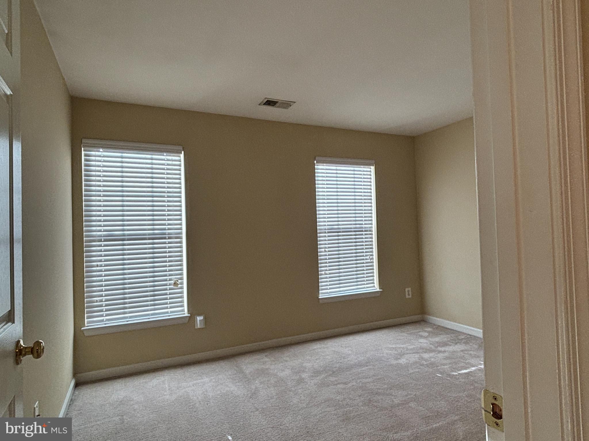 1538 Grosbeak Court Woodbridge, VA 22191 - Photo 28 of 39 an empty room with windows