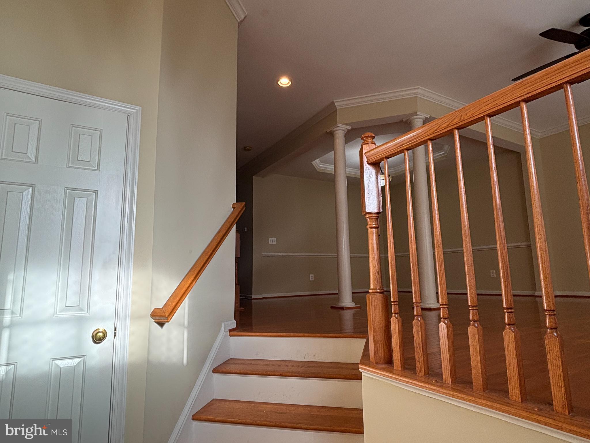 1538 Grosbeak Court Woodbridge, VA 22191 - Photo 3 of 39 a view of staircase with lots of frames on wall and stairs
