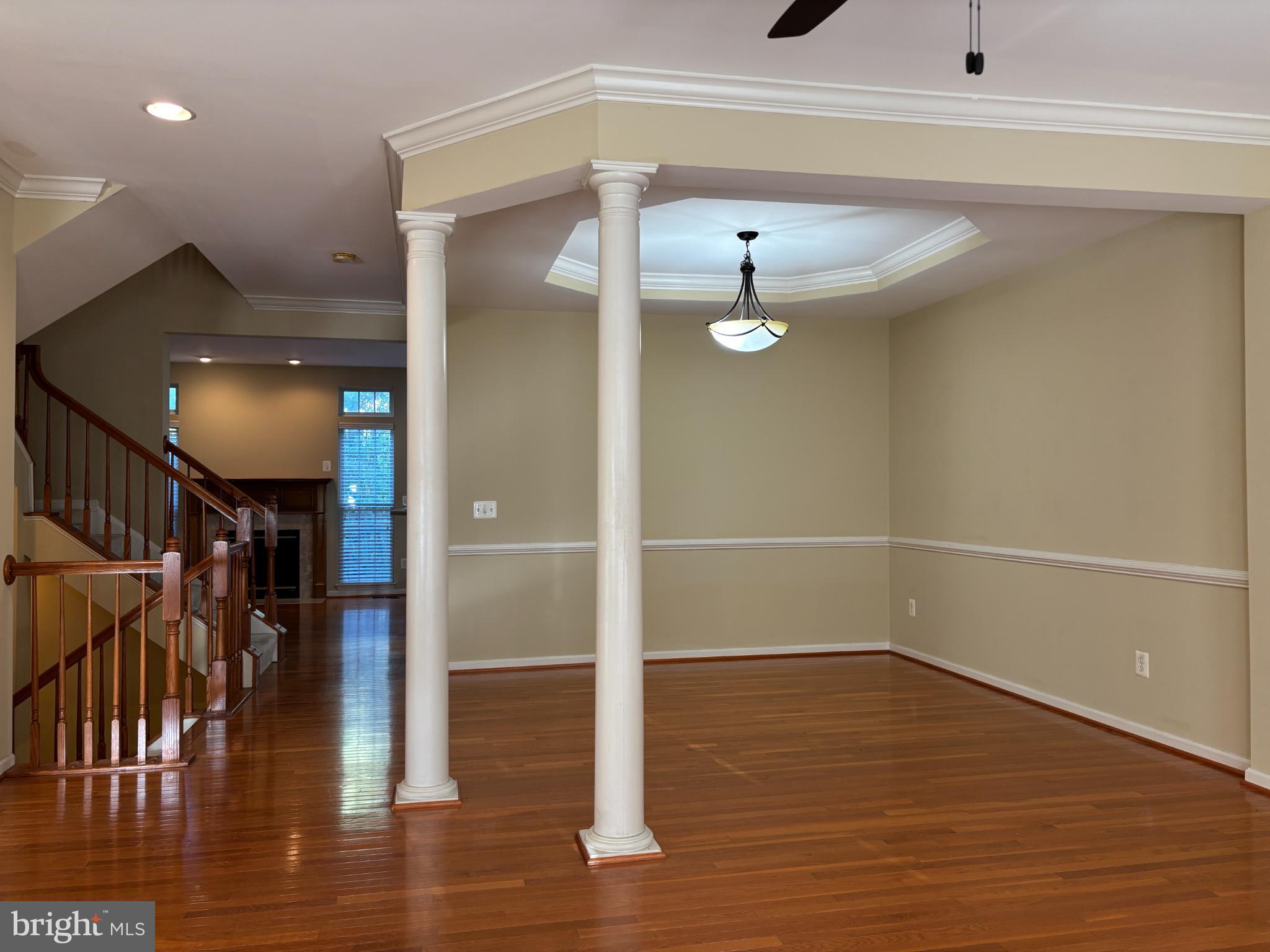 1538 Grosbeak Court Woodbridge, VA 22191 - Photo 4 of 39 a view of a hallway with wooden floor