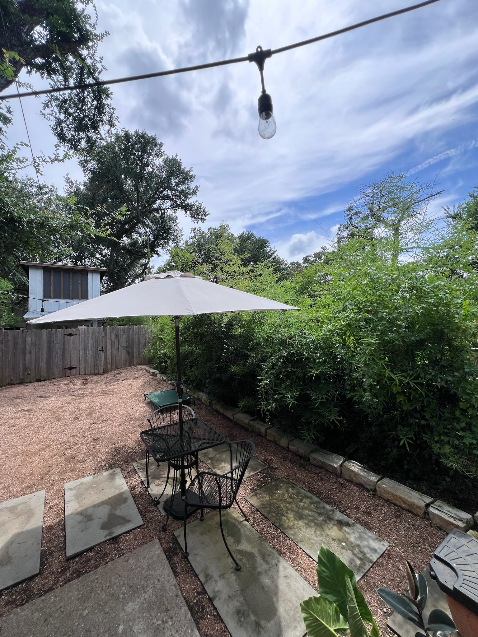 307 East 35th Street, Unit A Austin, TX 78705 - Photo 4 of 31 An inviting outdoor patio offers a private space for relaxation and alfresco dining.
