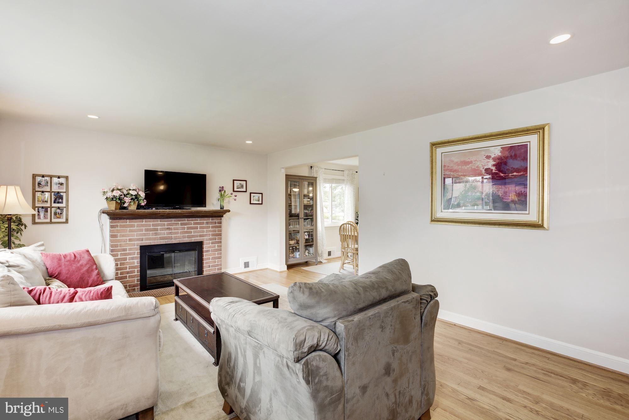6018 Craig Street Springfield, VA 22150 - Photo 2 of 30 Brick surround fireplace