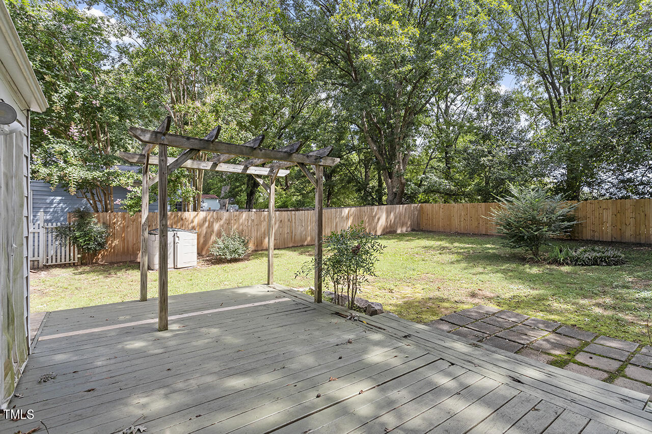1716 Bennett Street Raleigh, NC 27604 - Photo 24 of 30 a view of a yard with a tree