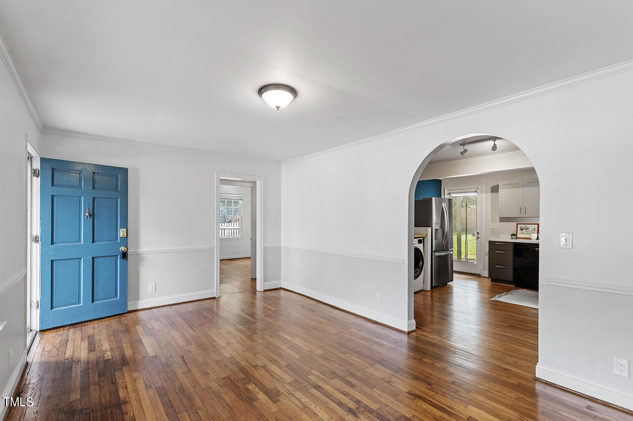 1716 Bennett Street Raleigh, NC 27604 - Photo 3 of 30 wooden floor in an empty room with a window