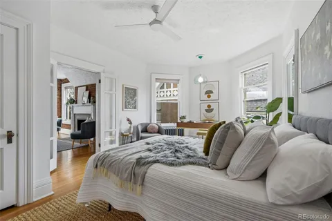 a bed room with a bed window and couch