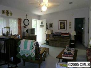 7923 Walkup Road Waxhaw, NC 28173 - Photo 2 of 8 a living room with furniture and wooden floor