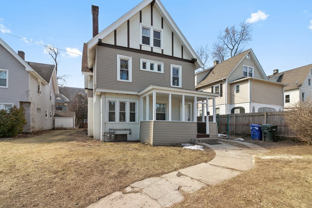 383 White Street Springfield, MA 01108 - Photo 1 of 39 a front view of a house with a yard