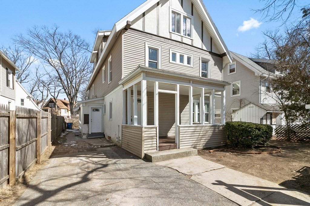 383 White Street Springfield, MA 01108 - Photo 2 of 39 a front view of a house with a yard