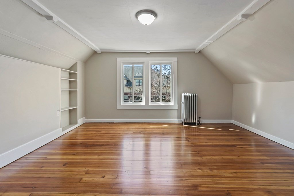 383 White Street Springfield, MA 01108 - Photo 25 of 39 a view of empty room with wooden floor and fan