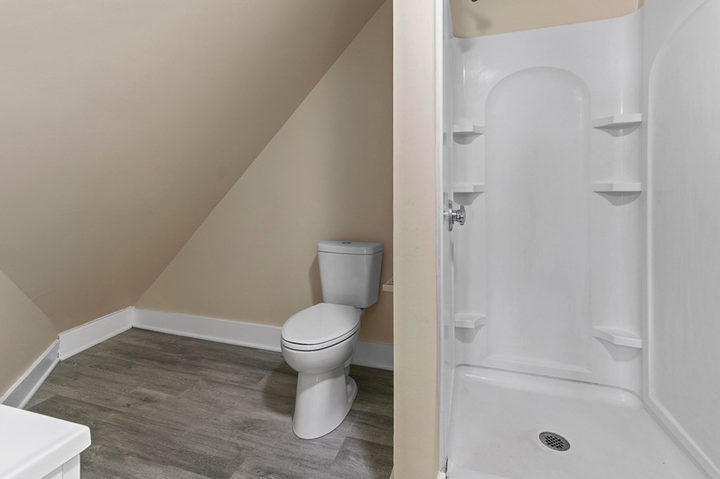 383 White Street Springfield, MA 01108 - Photo 30 of 39 a white toilet sitting next to a bathroom sink