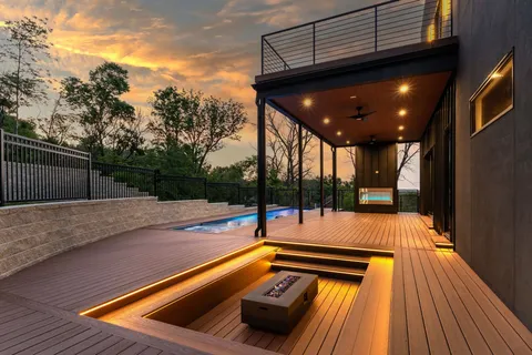 a view of swimming pool with seating space