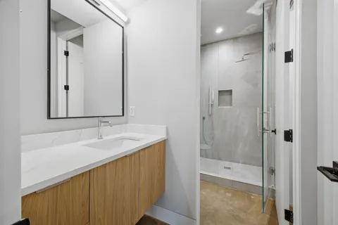 a bathroom with a sink and a mirror