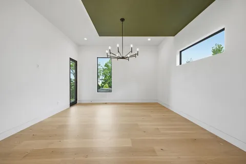a view of a swimming pool with furniture
