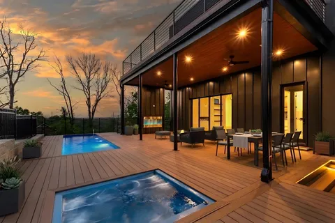 a swimming pool with an outdoor seating