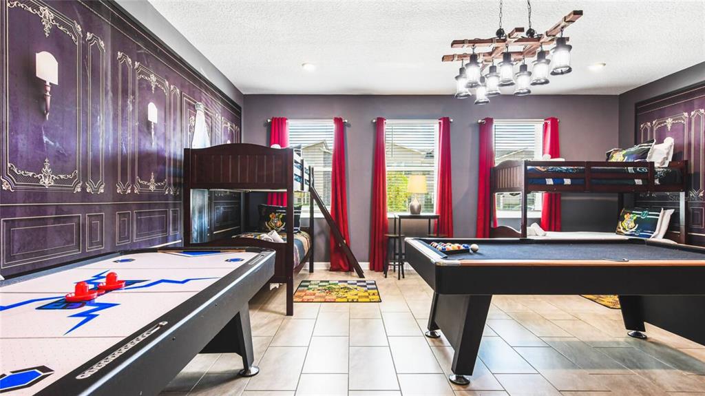 2916 Simile Street Kissimmee, FL 34746 - Photo 14 of 55 a room with musical instruments