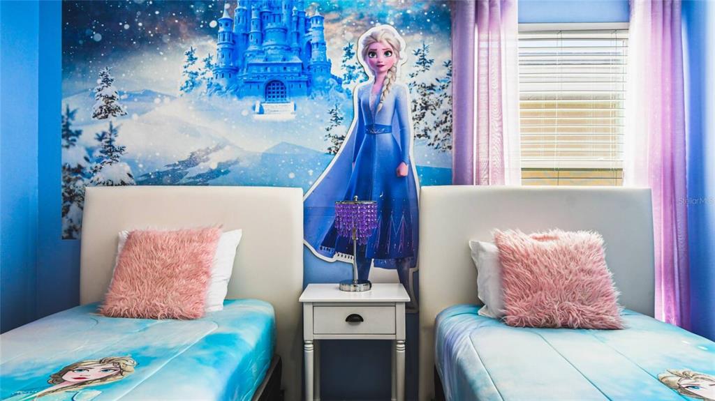 2916 Simile Street Kissimmee, FL 34746 - Photo 21 of 55 a living room with furniture and a window