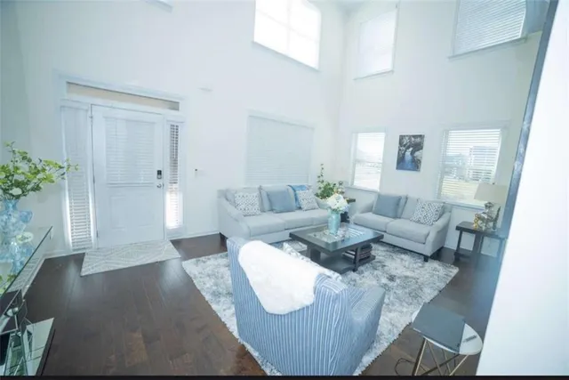 a living room with furniture and a couch