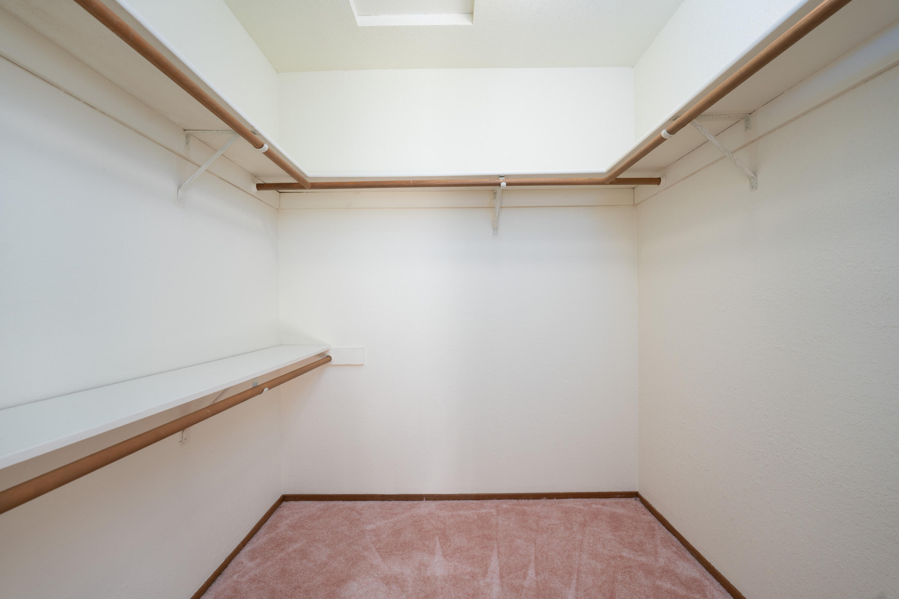 853 Oakmont Drive Redding, CA 96003 - Photo 21 of 37 a view of walk in closet with empty racks