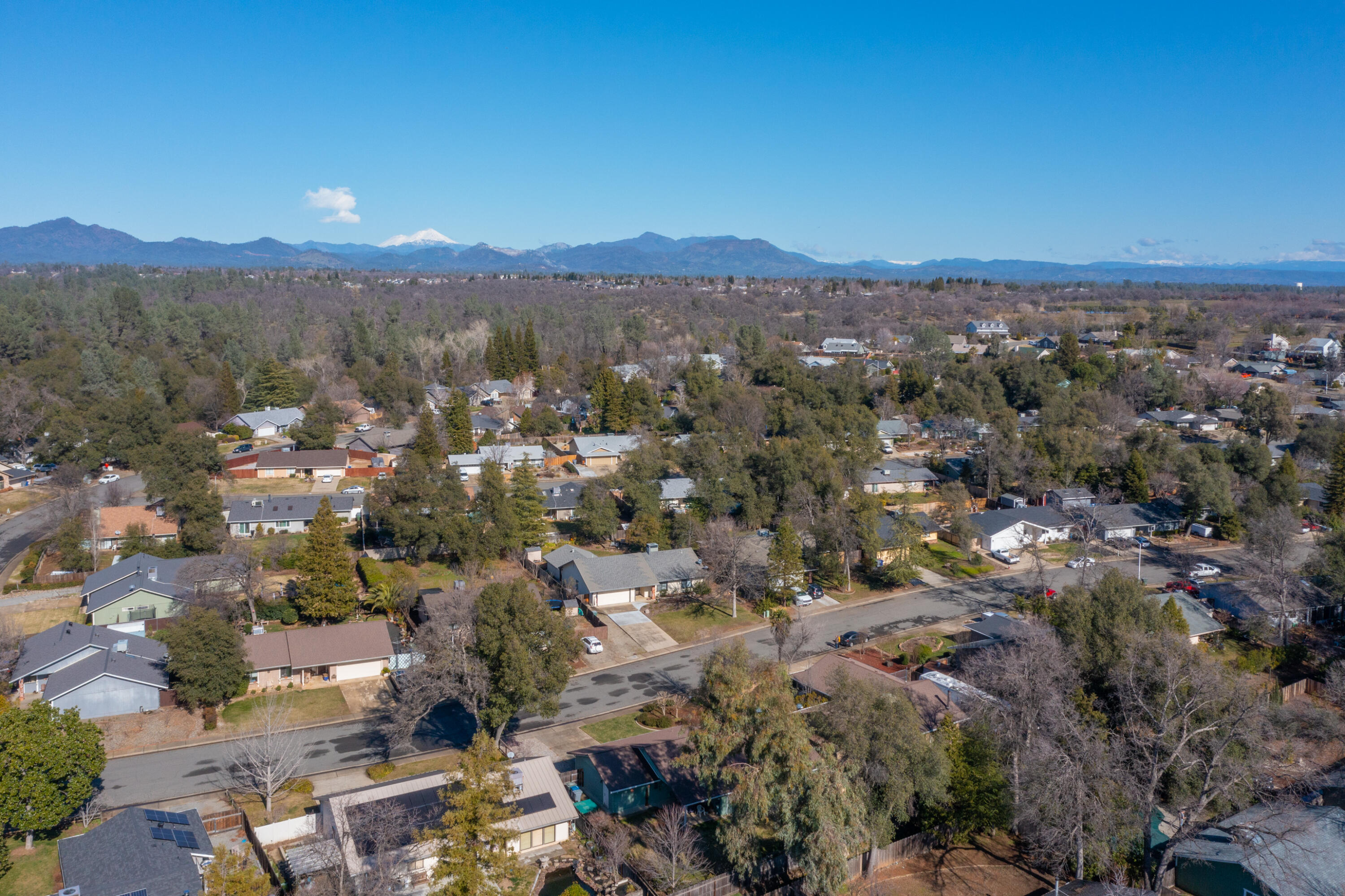 853 Oakmont Drive Redding, CA 96003 - Photo 35 of 37 an aerial view of residential houses with outdoor space and trees