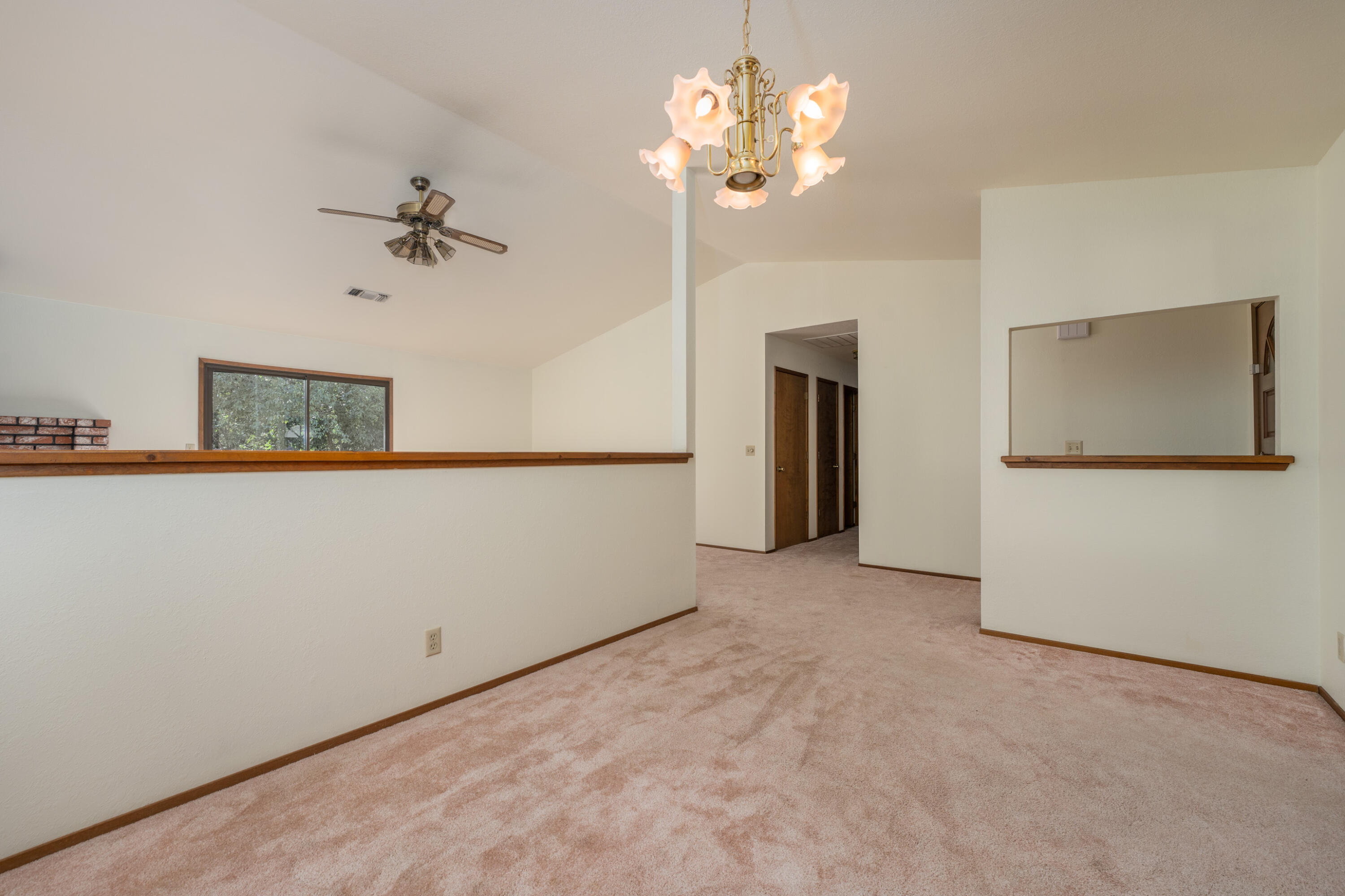 853 Oakmont Drive Redding, CA 96003 - Photo 7 of 37 a view of a chandelier in a room