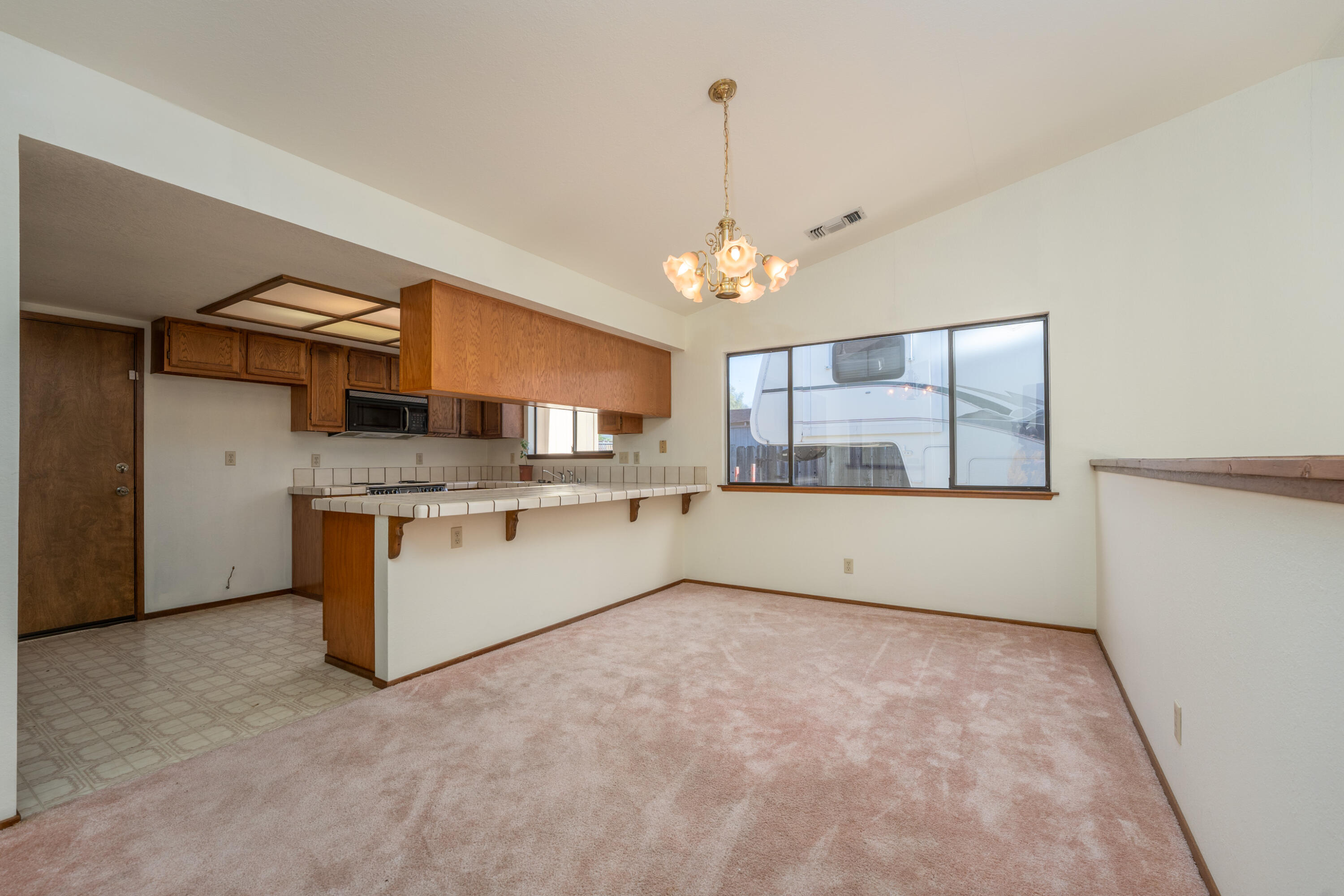 853 Oakmont Drive Redding, CA 96003 - Photo 8 of 37 a view of a kitchen with electric appliances