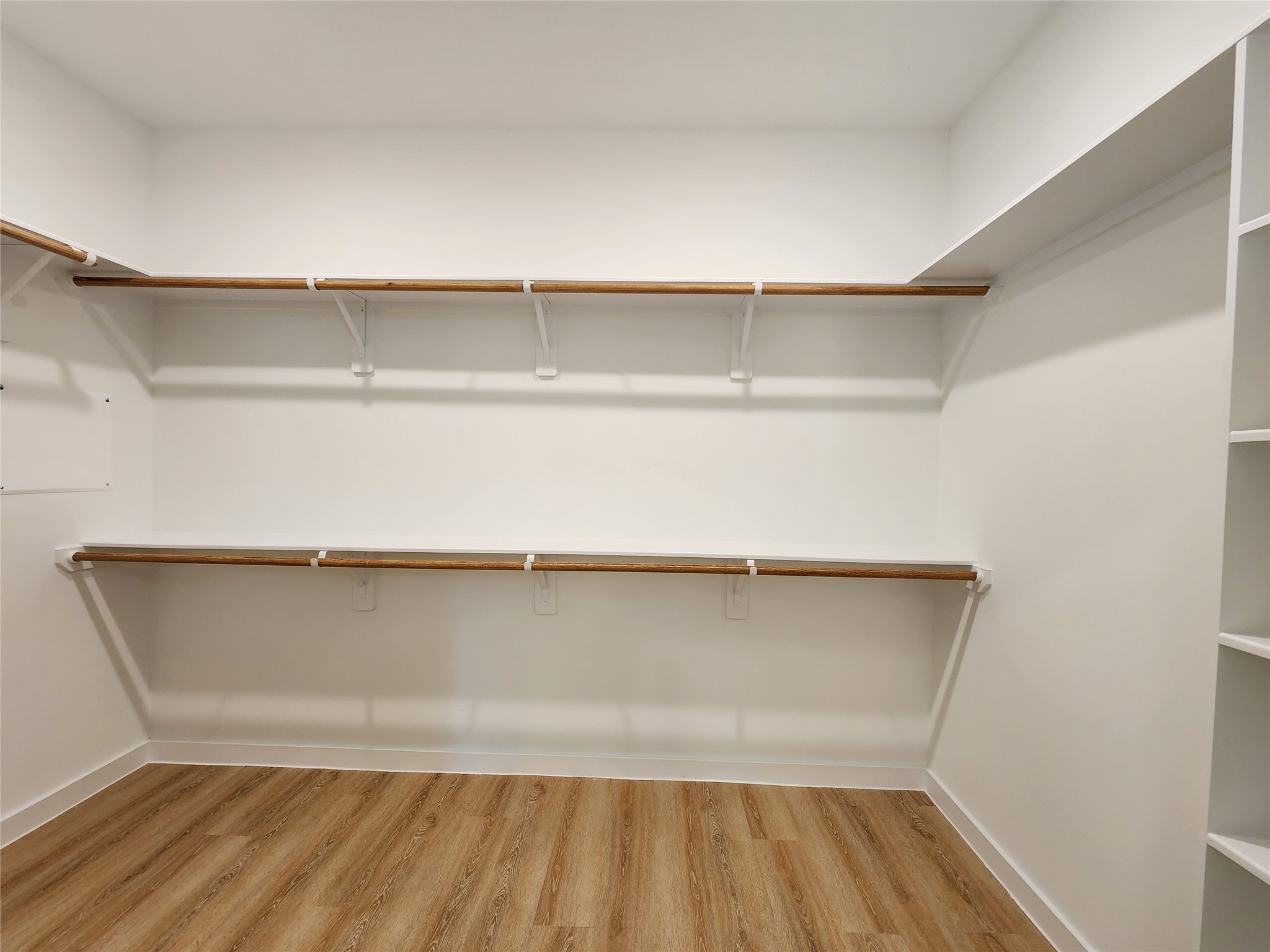 7817 Beckley Street, Unit A Houston, TX 77088 - Photo 12 of 18 a hallway view with wooden floor