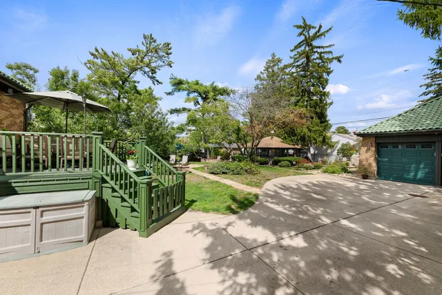 a pathway of a house with a yard