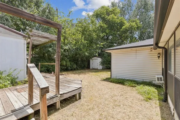 a house view with a backyard space