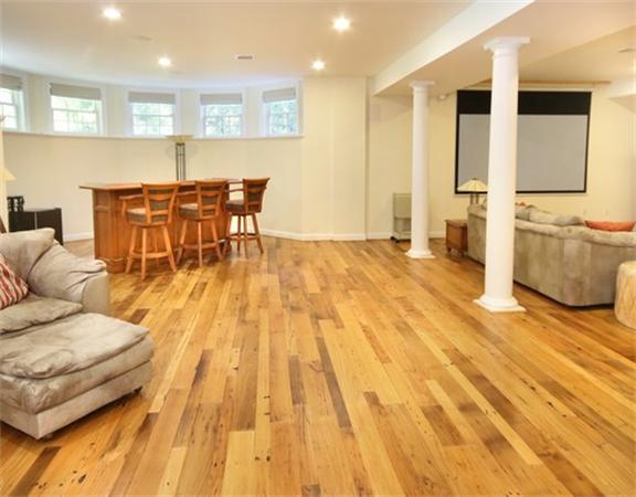 75 Page Road Lincoln, MA 01773 - Photo 20 of 25 a living room with furniture and a table
