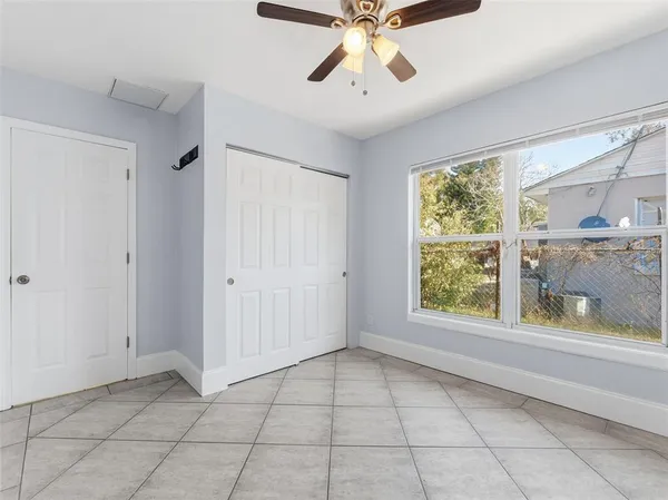 a view of an empty room with a window