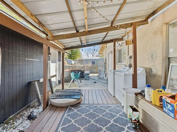 a outdoor space with lots of furniture and shower