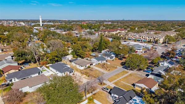 an aerial view of residential building with parking space