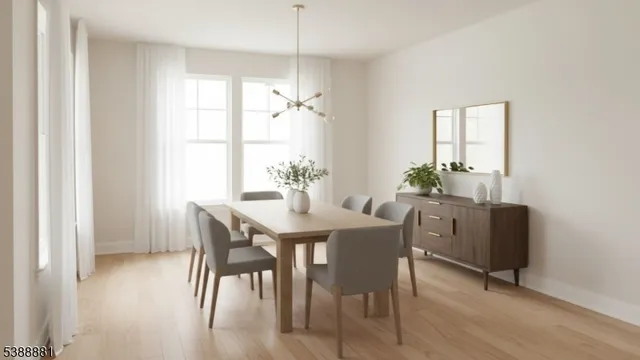 a view of a dining room with furniture and window