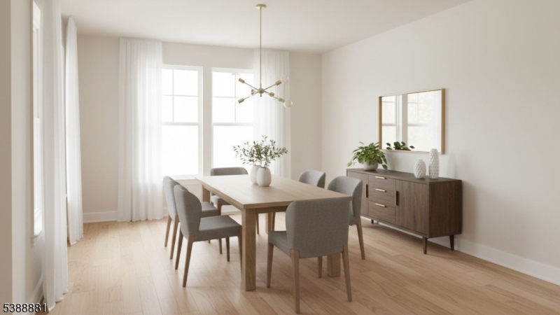 9 Century Place Passaic, NJ 07055 - Photo 5 of 9 a view of a dining room with furniture and window