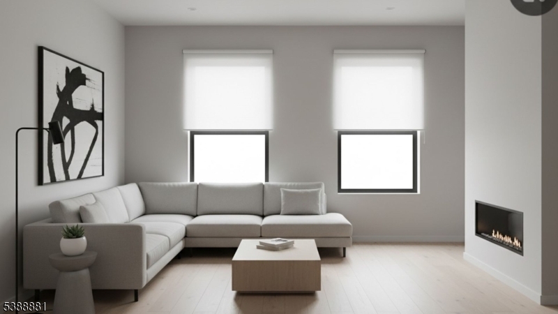9 Century Place Passaic, NJ 07055 - Photo 7 of 9 a living room with furniture and a window